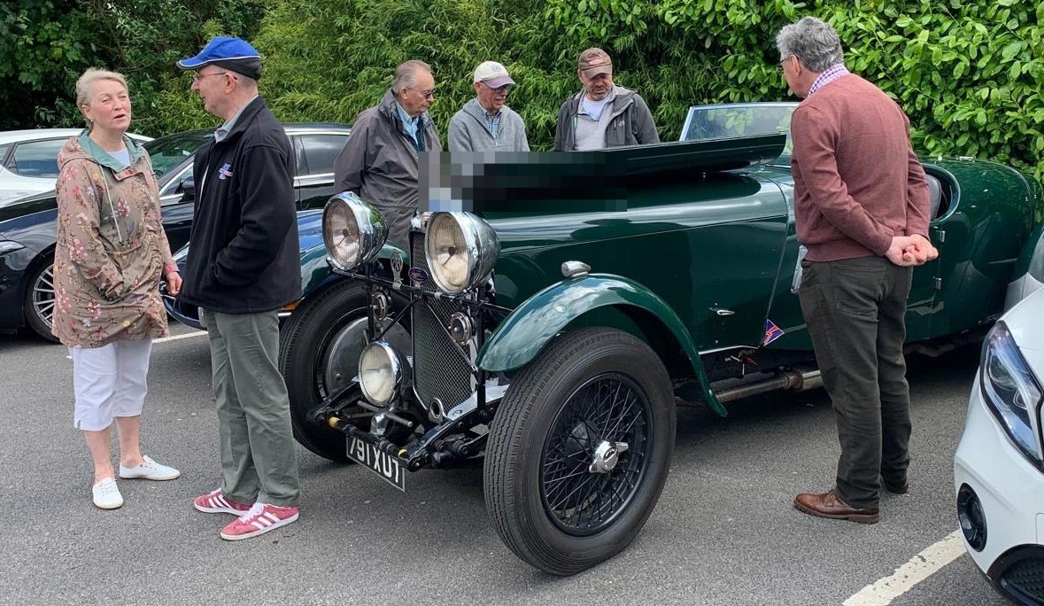 Green MG K3 Midget Roadster with two-tone paint and chrome accents.